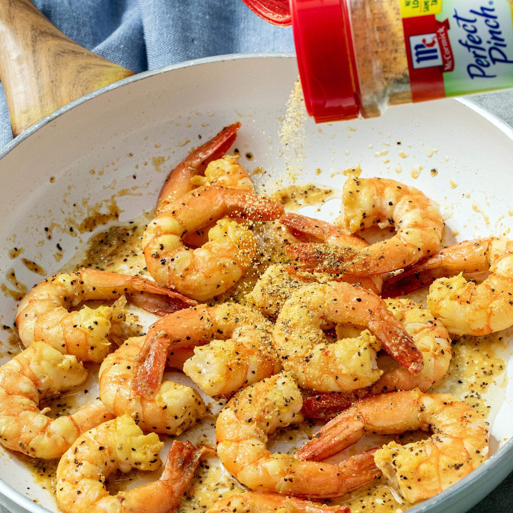 Salad bowl with McCormick Lemon Pepper for vibrant, fresh taste.