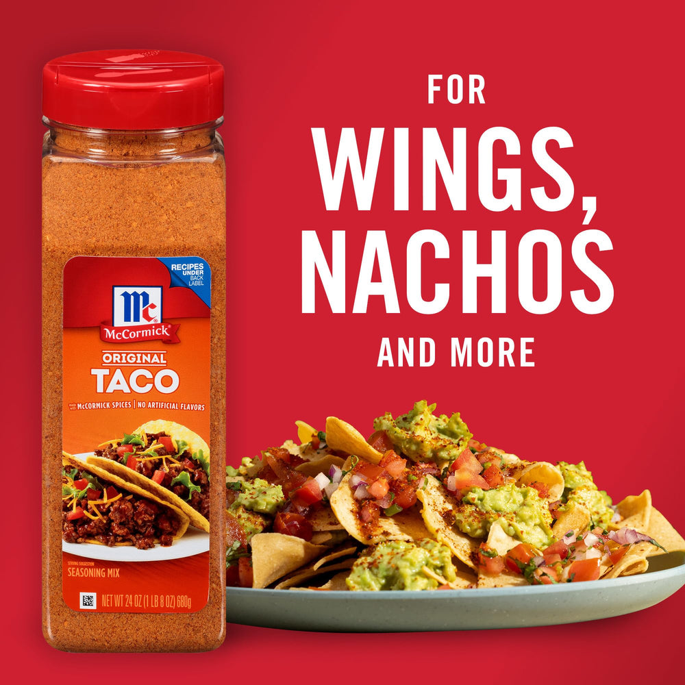 Closeup of McCormick Original Taco Seasoning spice blend and herbs.