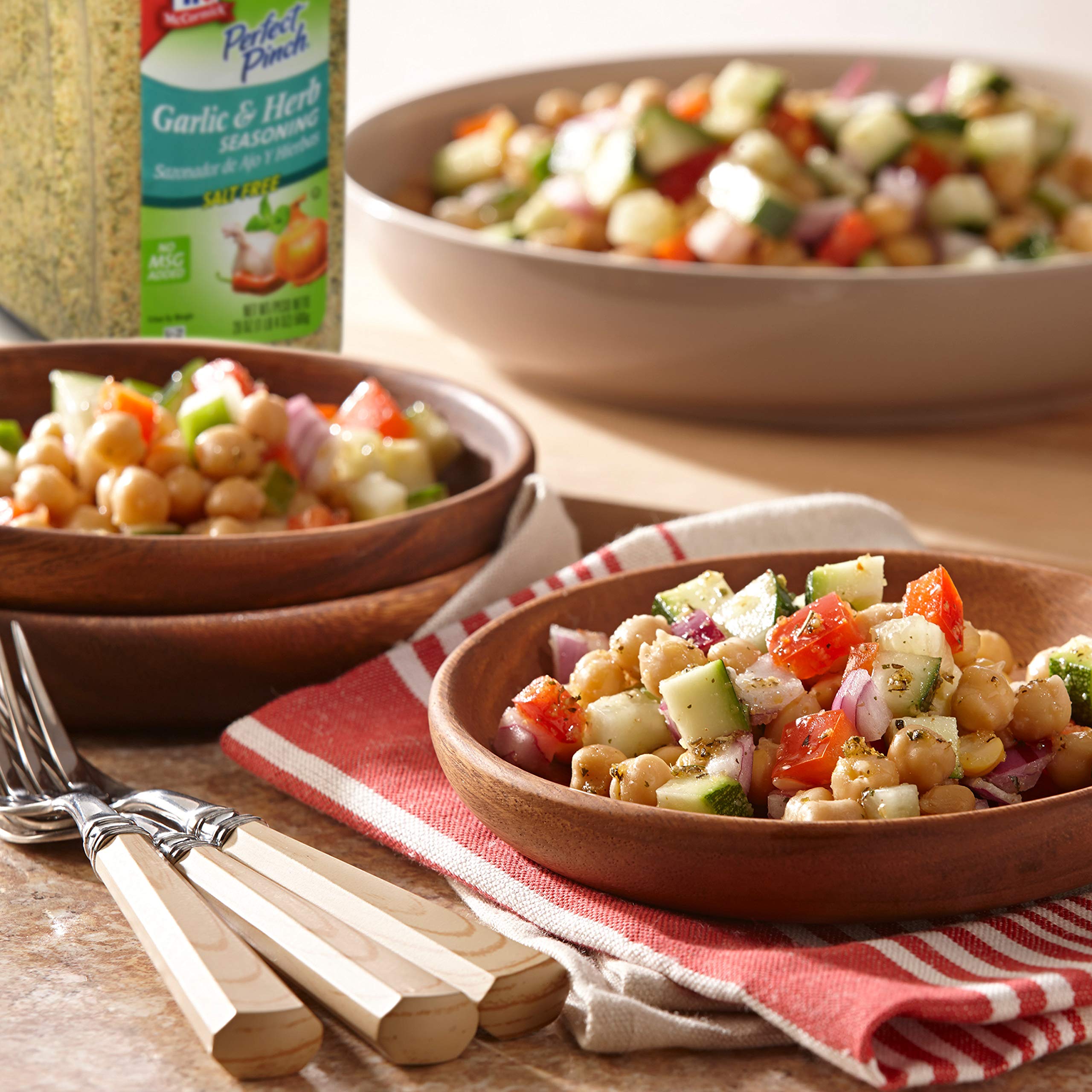 Tabletop usage of McCormick Perfect Pinch garlic herb seasoning for quick flavor