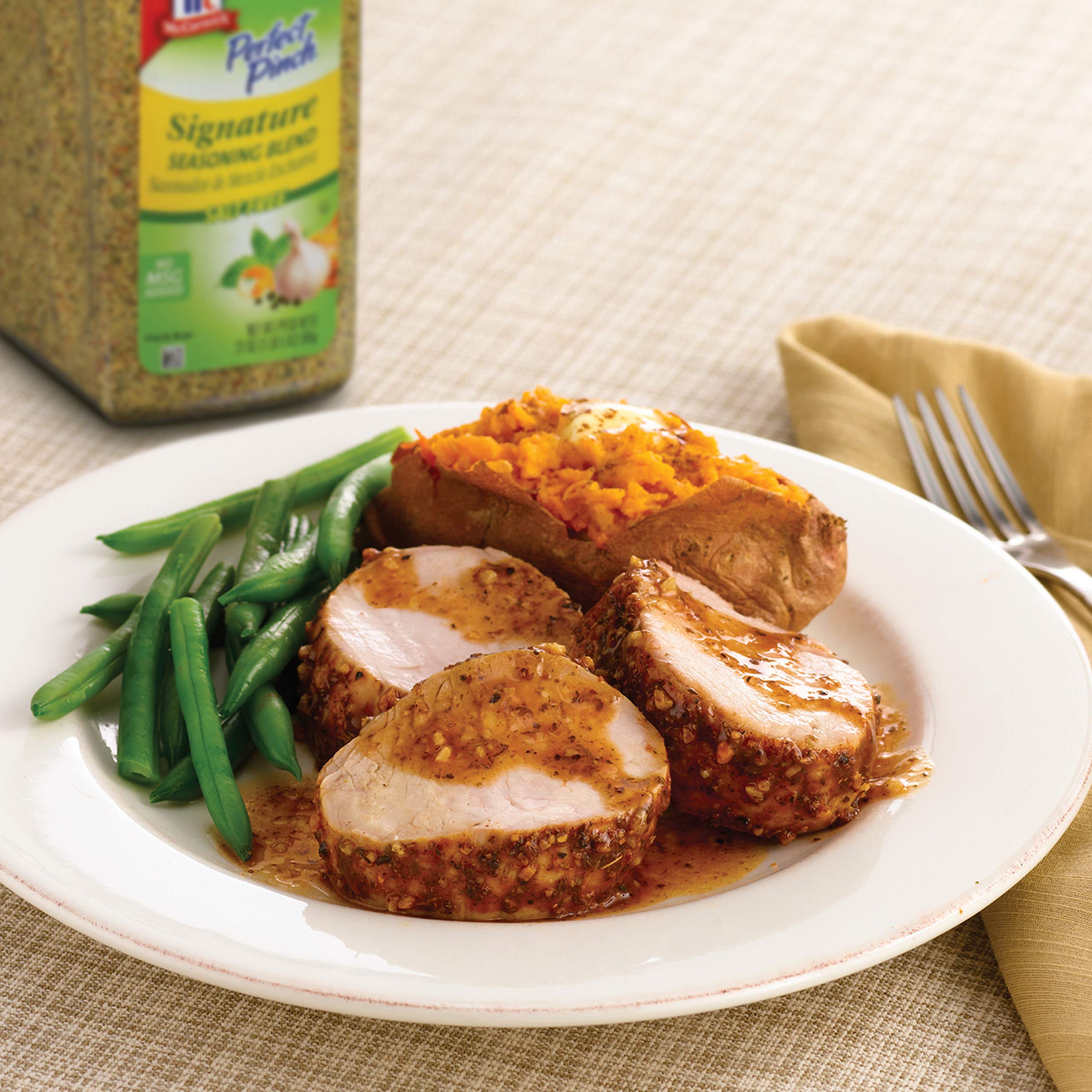 McCormick Perfect Pinch Signature Seasoning enhances seafood with savory aroma.