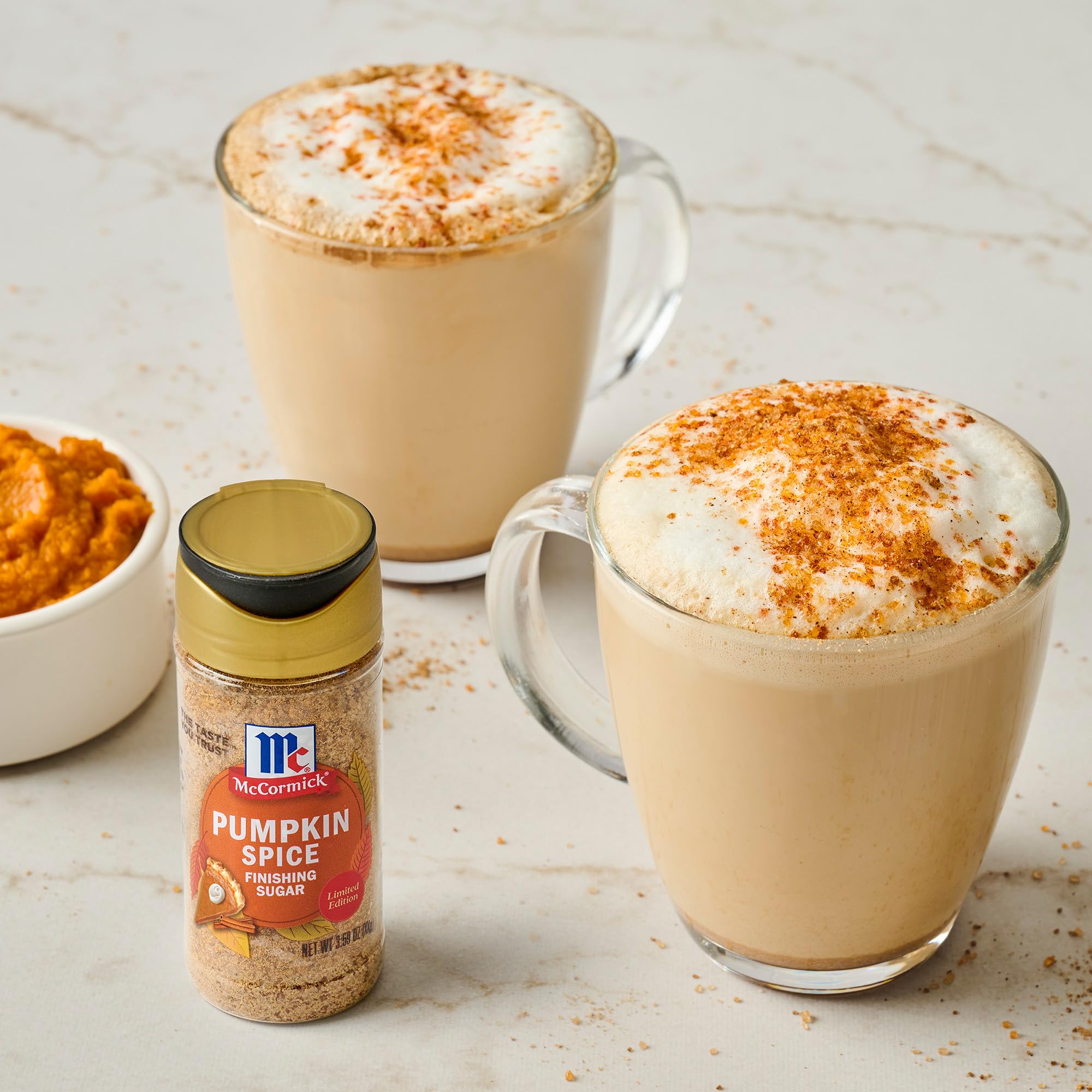 Stirring McCormick Pumpkin Spice Finishing Sugar into batter for warm notes