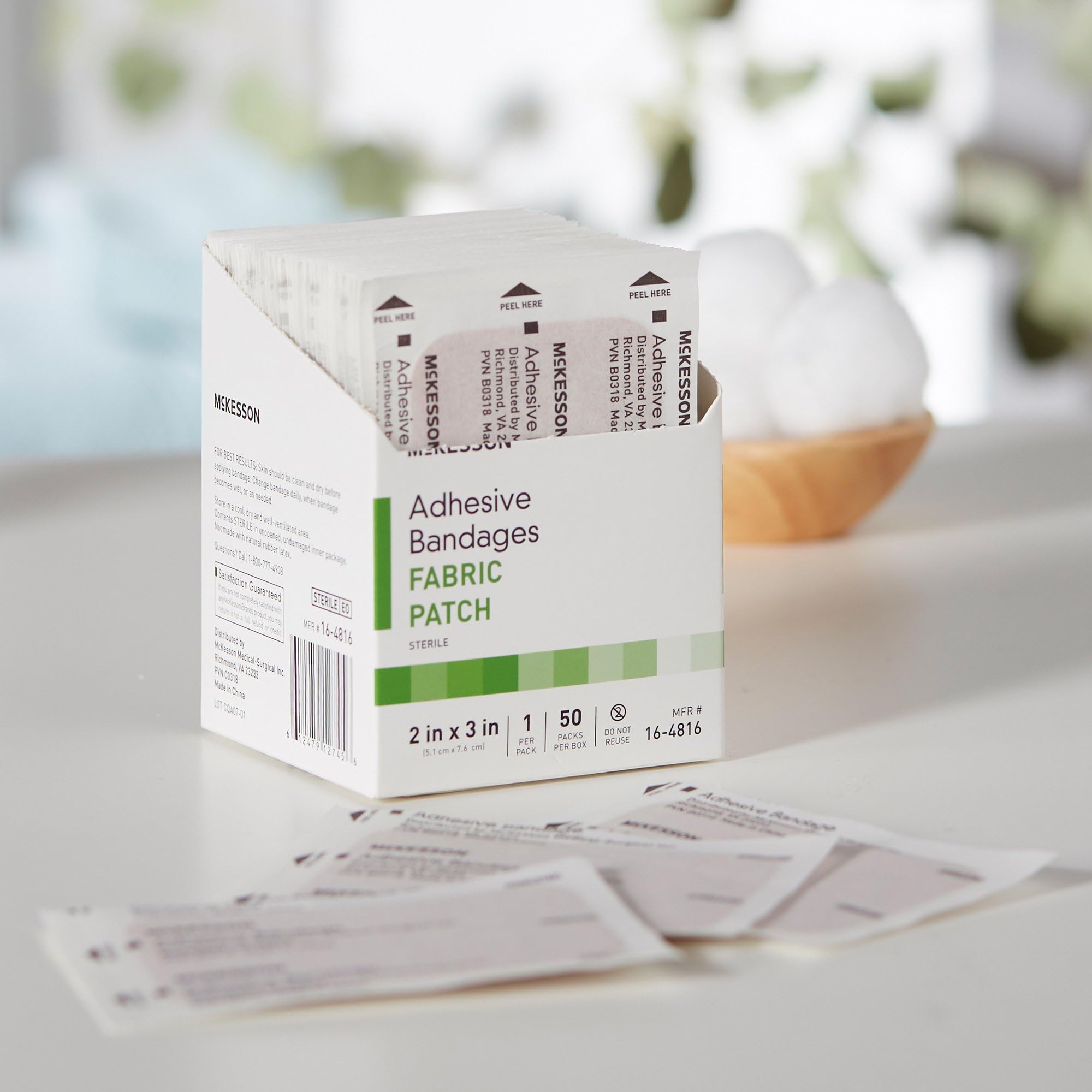 McKesson ready-to-use bandage on hand demonstrates quick, convenient first aid.