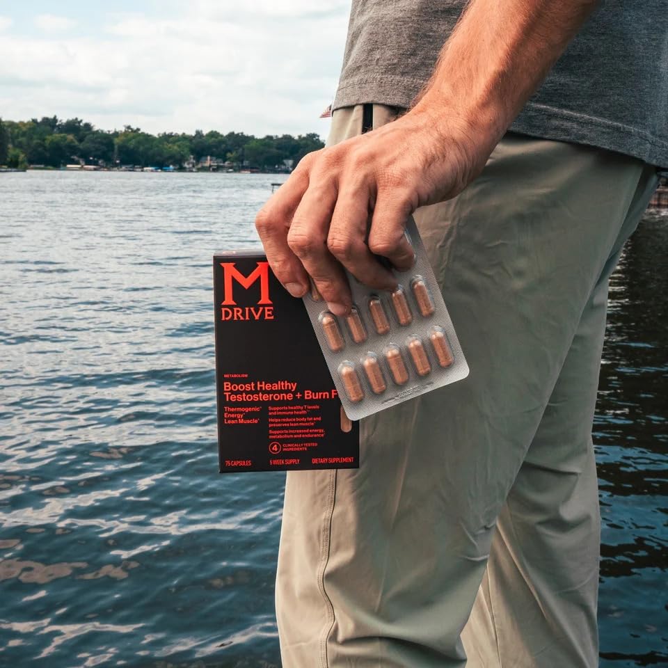 Mdrive Boost and Burn lifestyle shot with trainer emphasizing energy and focus for workouts