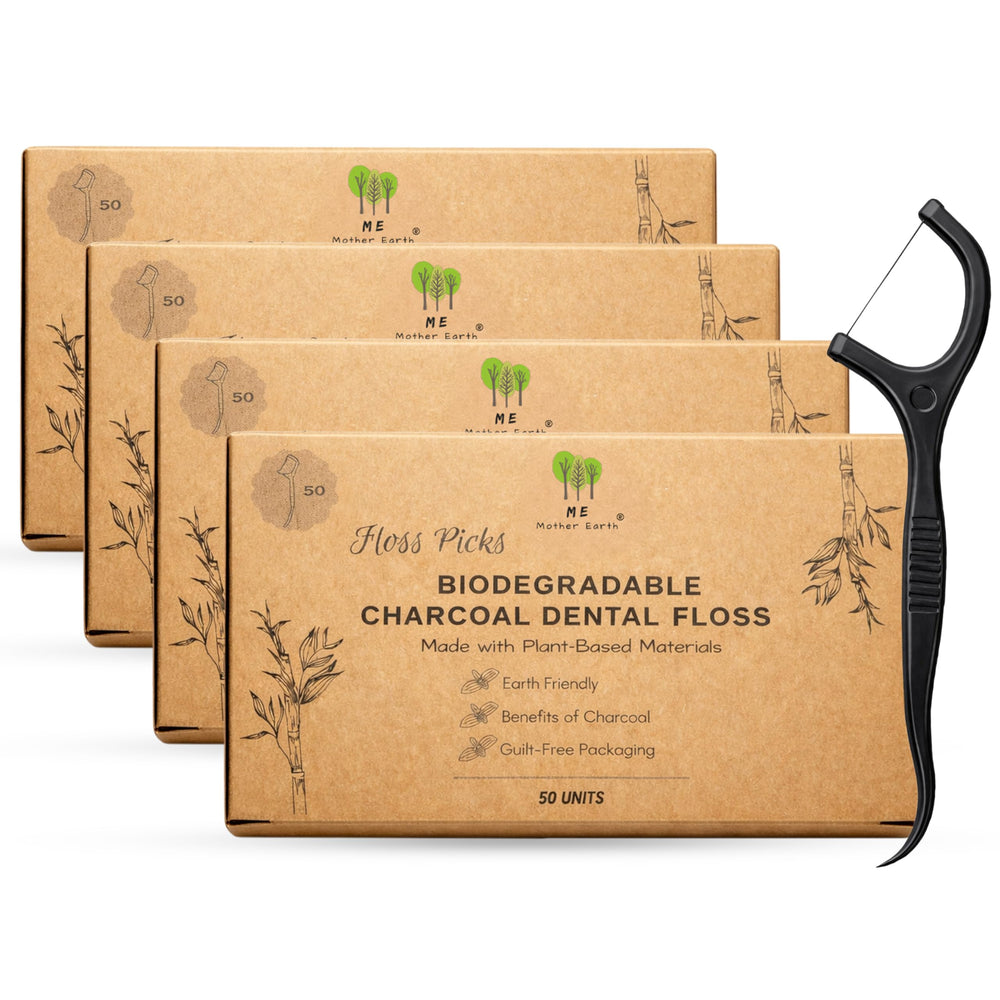 Me Mother Earth floss picks with charcoal bamboo for on-the-go cleaning and fresh breath.