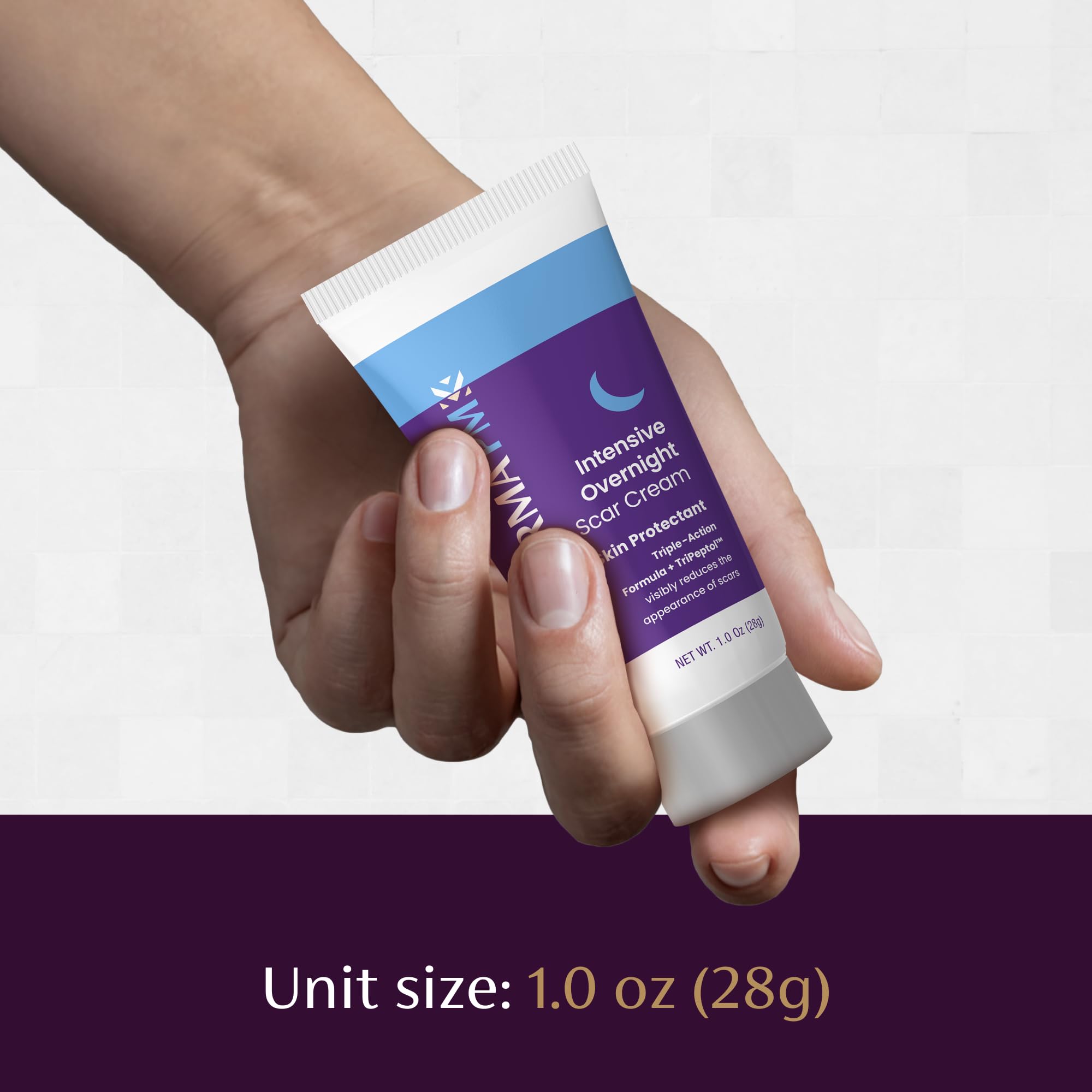 Mederma PM packaging close-up highlights Tripeptol complex and overnight formula.