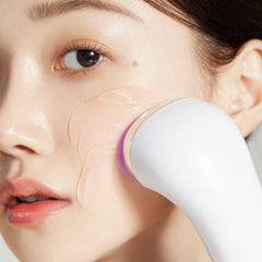 Applying Medicube Age-R Booster Gel Serum to the skin for nourishment.