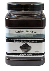 Medley Hills Farm black cocoa powder in a reusable container for easy baking prep.