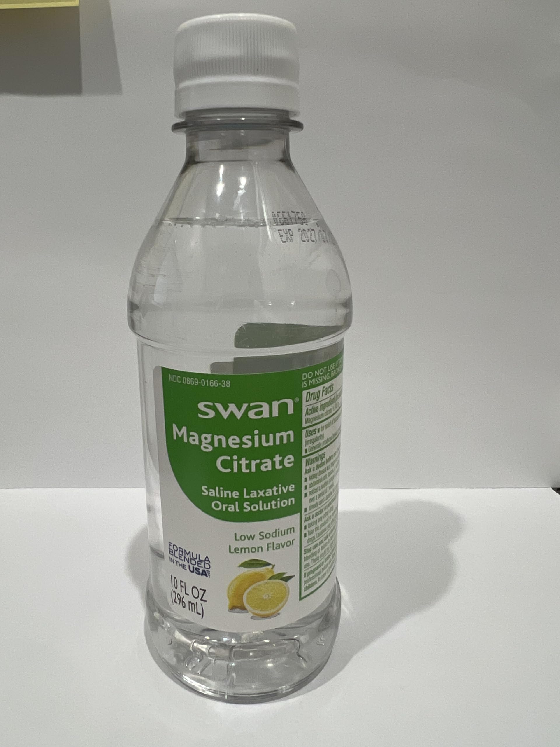 Glass with water beside the MedRite bottle, a simple hydration-friendly routine.