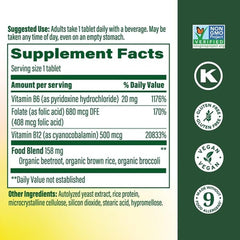 Pour action showing easy on-the-go dosing of MegaFood B12 mini-tablet
