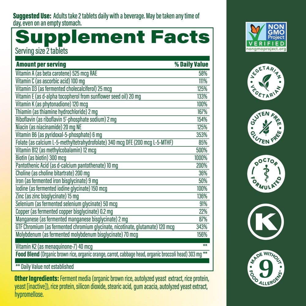 Close-up of MegaFood tablets highlighting iron and B vitamins for energy metabolism.