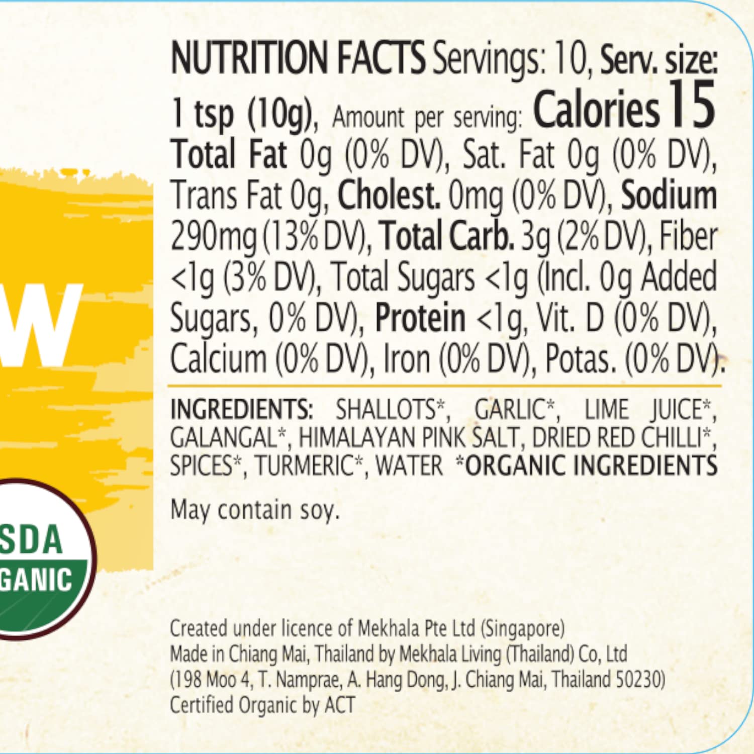 Spoonful of Mekhala Yellow Curry Paste highlighting concentrated, versatile paste