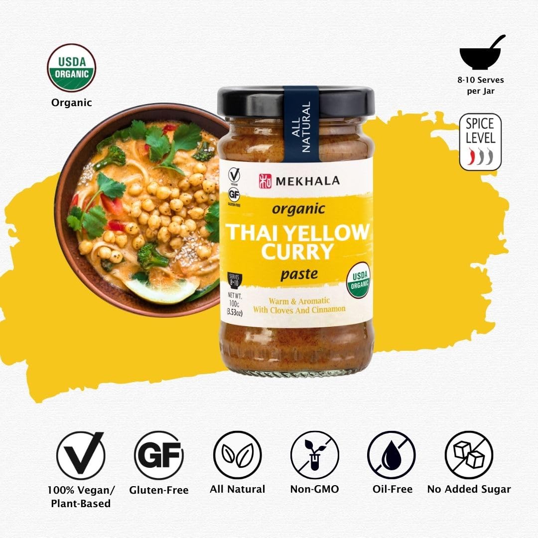 Pan view of Mekhala Yellow Curry Paste used in a sizzling stir-fry