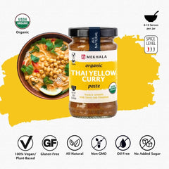 Pan view of Mekhala Yellow Curry Paste used in a sizzling stir-fry