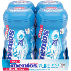 Mentos curvy bottle perched at desk for quick freshness.