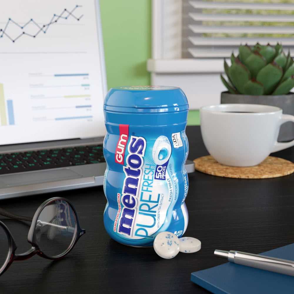 Mentos mint packaging communicates long-lasting mint flavor and convenience.