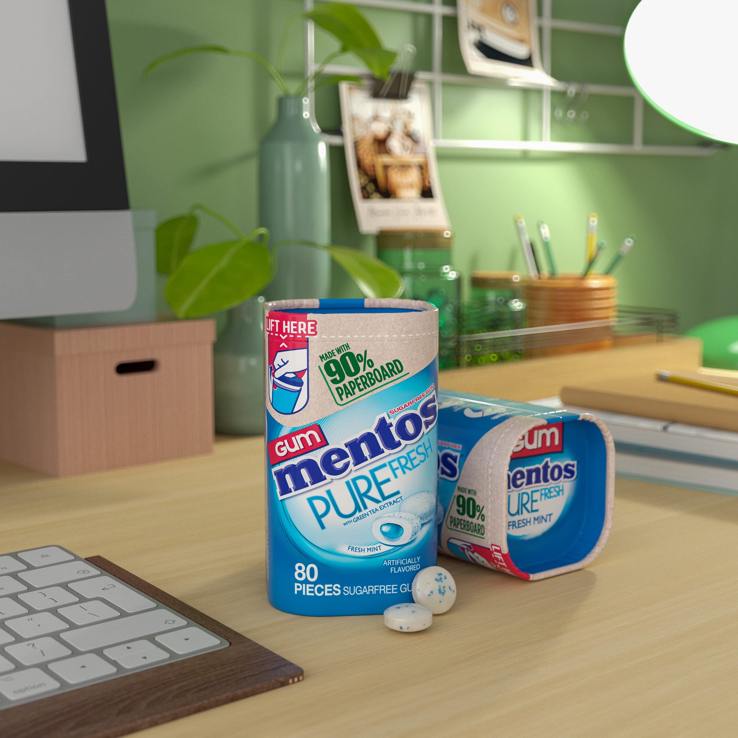 Mentos Pure Fresh bottle placed on desk car or purse for on-the-go freshness