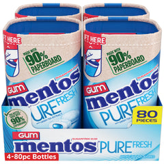Mentos Pure Fresh gum bottle open, with pieces visible for desk or car freshness.