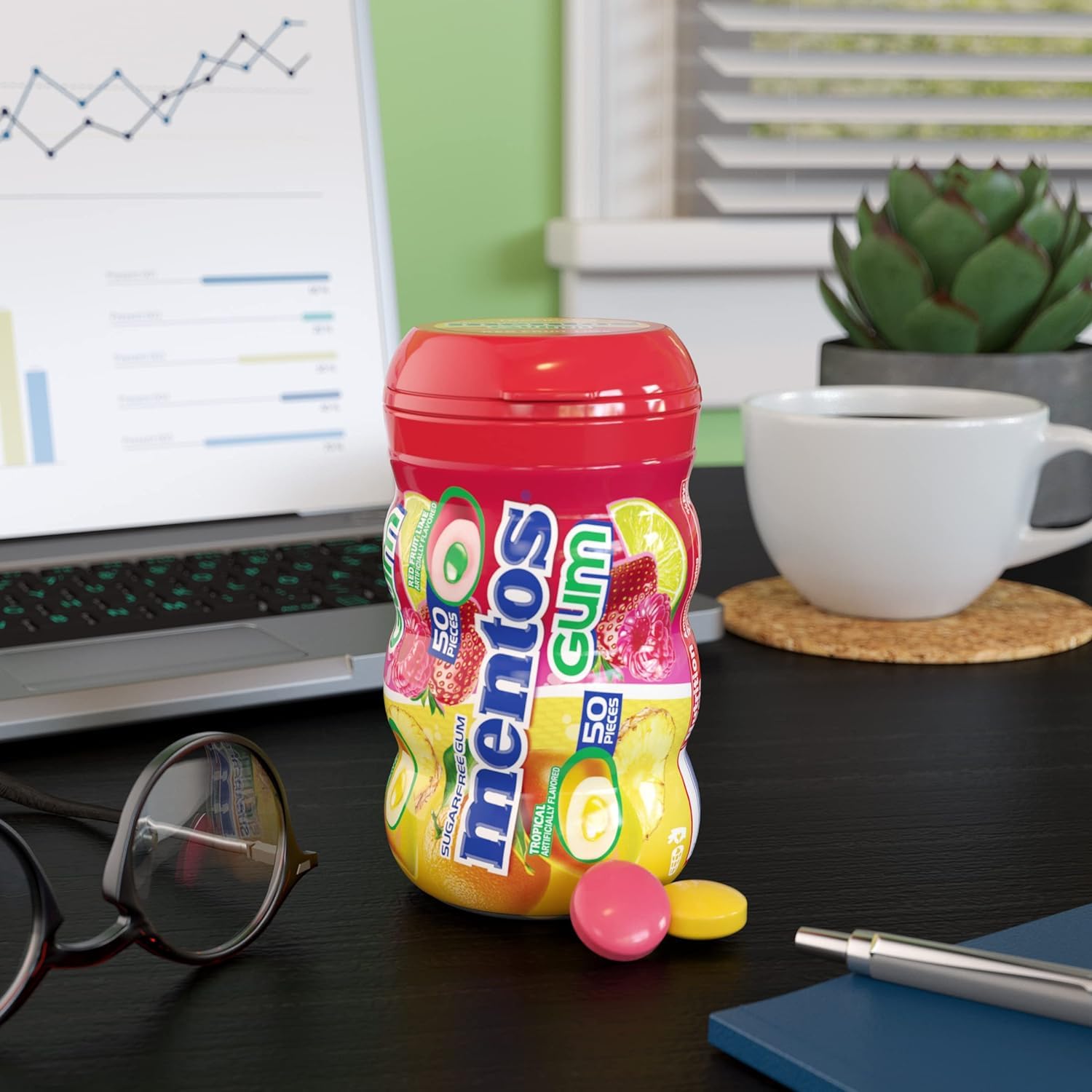 Mentos on a desk setup shows convenient freshness bursts.