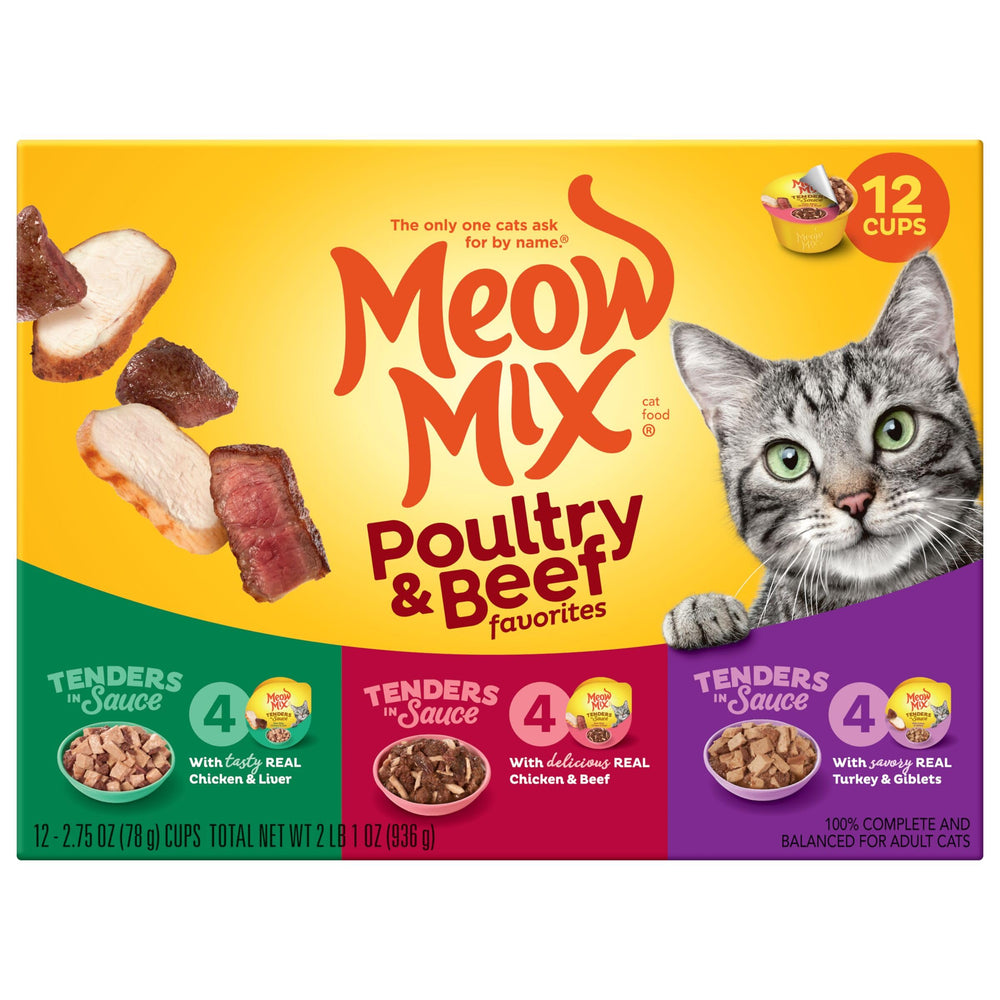 Meow Mix Tender cat enjoying a meal with savory sauce