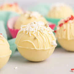 Merckens White coating wafers ideal for molded candy and bark creations.