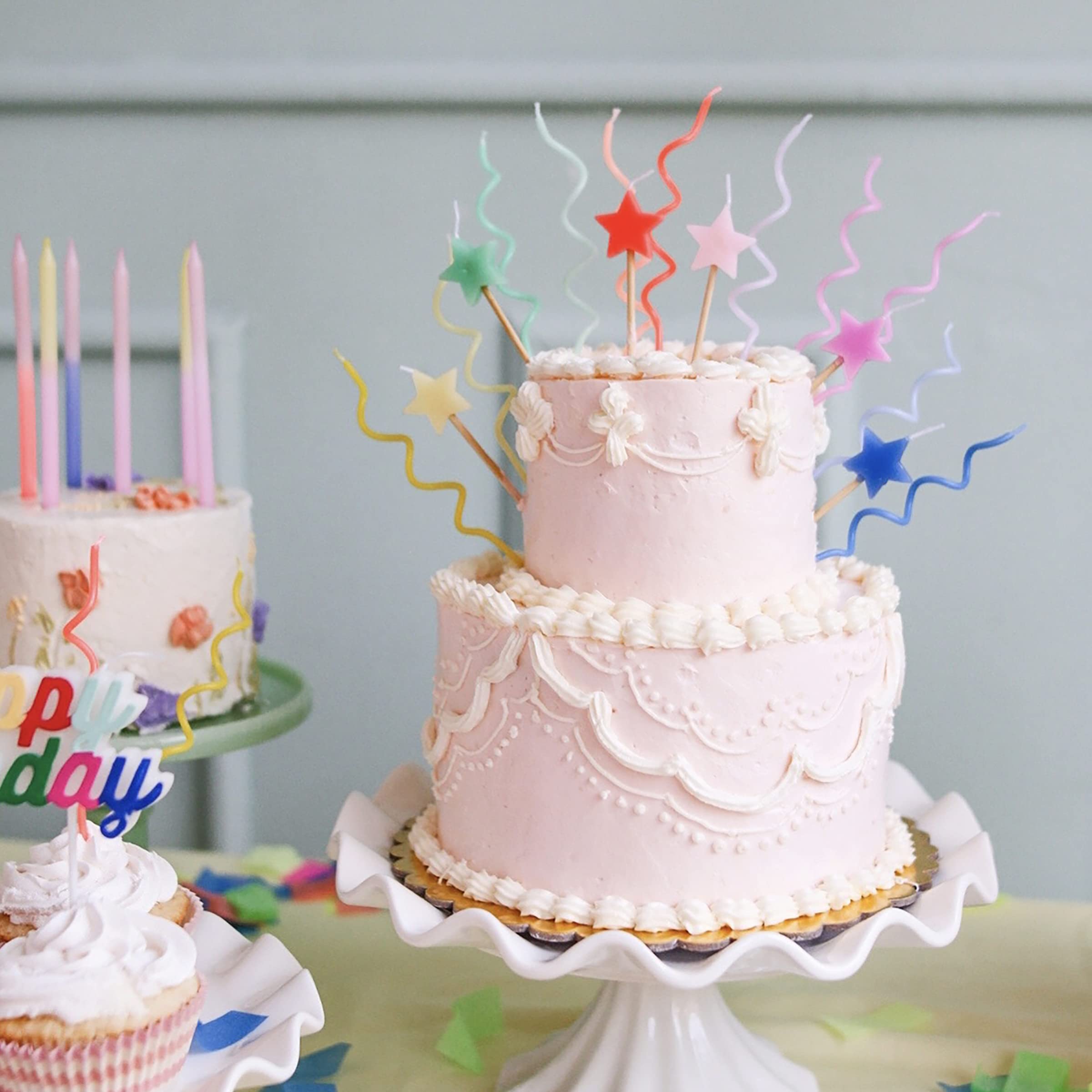 Meri Meri star candles in bright colors, perfect for colorful birthday cake celebrations.