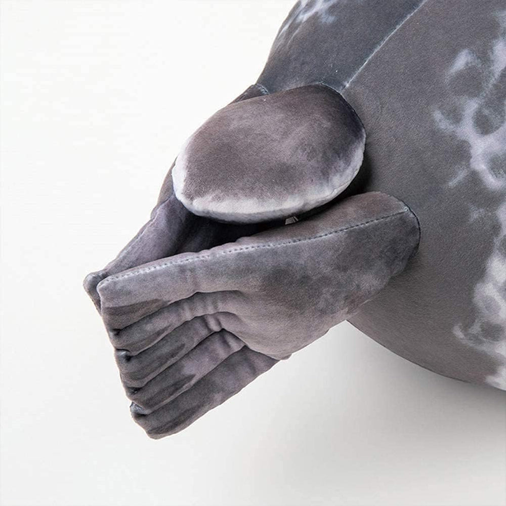 MerryXD Chubby Seal Pillow in bed setup for relaxing comfort
