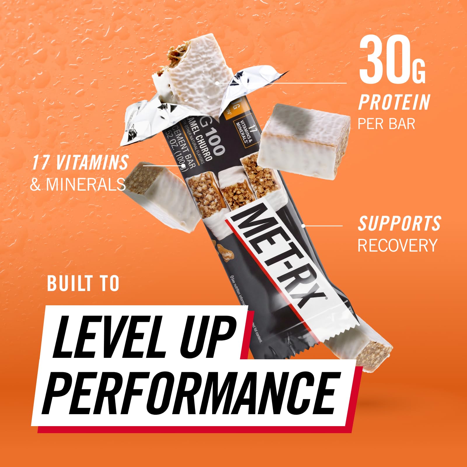 MET-Rx Big 100 Colossal bar held in hand, ideal for workouts.