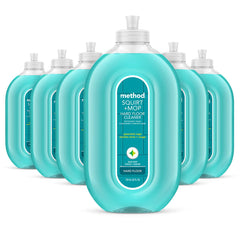 Method hardwood floor cleaner bottle with spearmint sage scent for easy one-step cleaning.