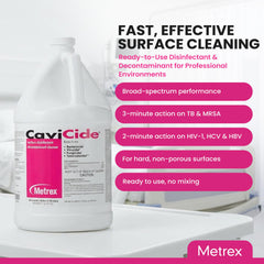Metrex CaviCide spray-bottle in action on a tray for rapid cleaning.