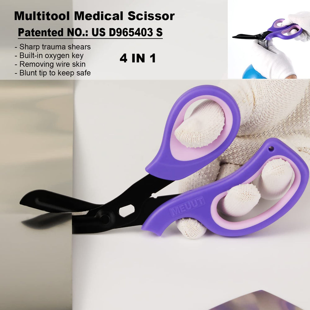 MEUUT trauma scissors in outdoor use, cutting fabric and belts safely.