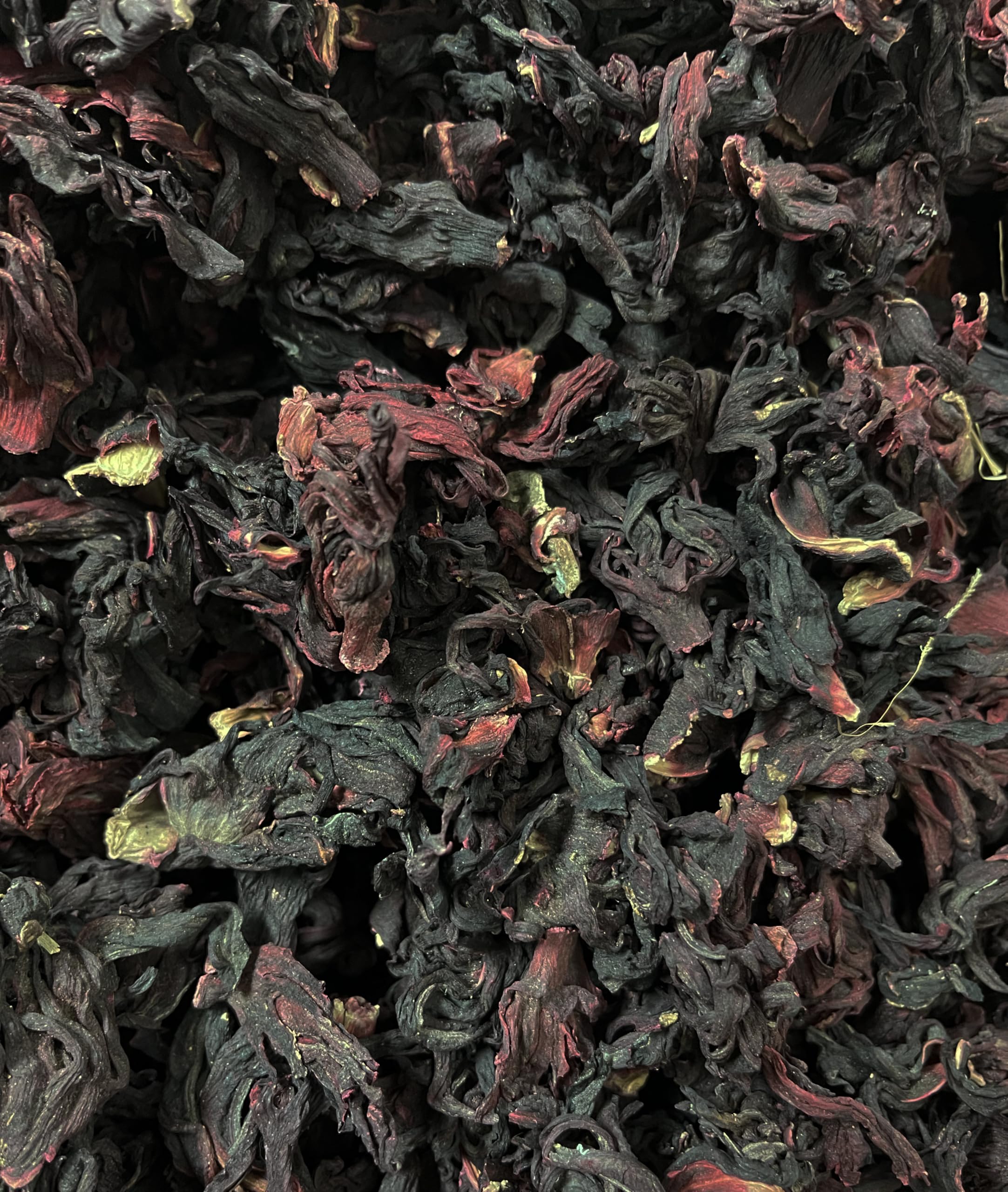 Mexgrim dried hibiscus petals closeup showing vibrant red color for infusions.