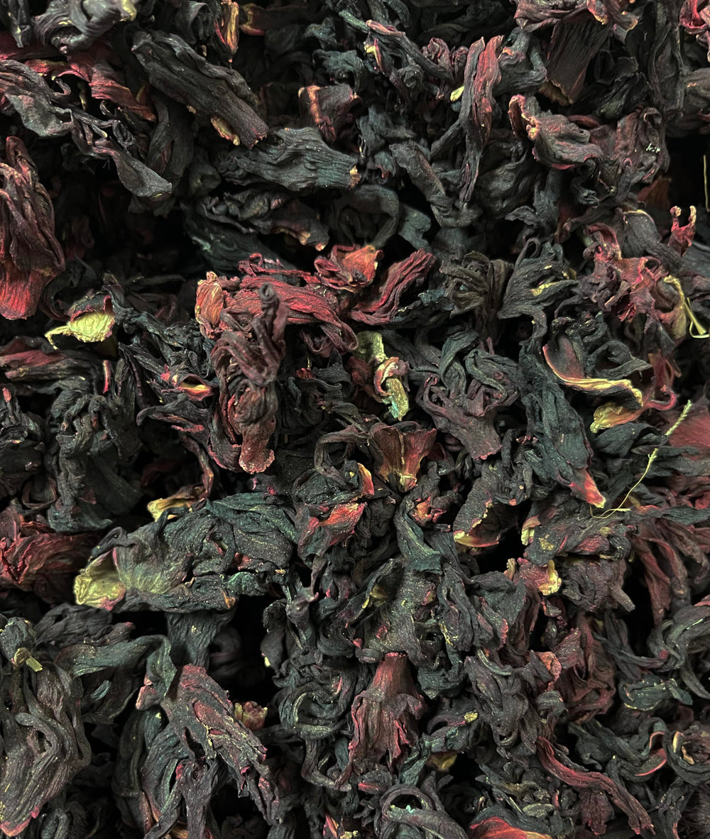 Mexgrim dried hibiscus petals closeup showing vibrant red color for infusions.