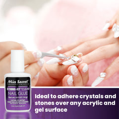 Crystals secured with Mia Secret glue on acrylic-ready nails during wear.