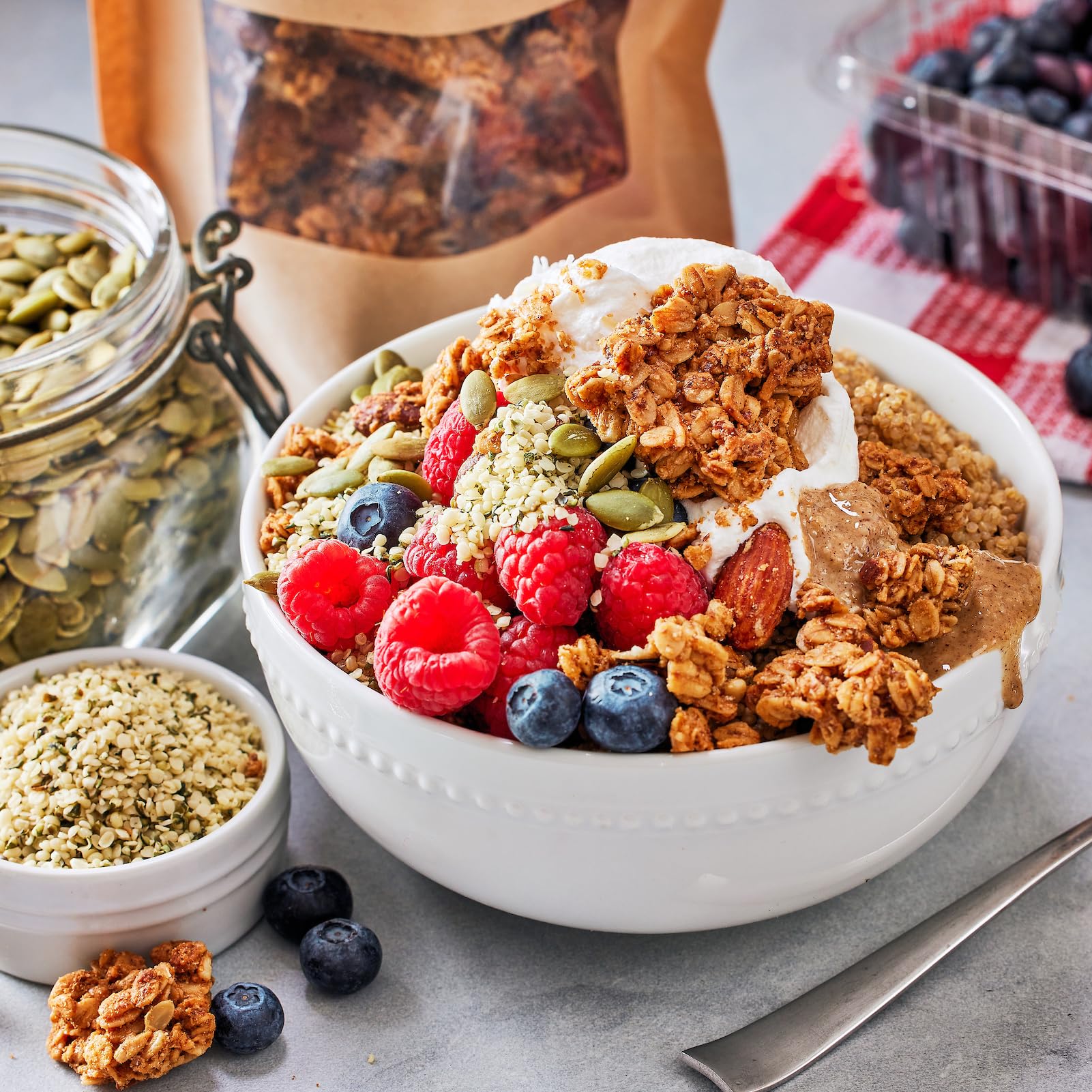 Serving bowl with Michele’s Granola almond butter ready for breakfast.
