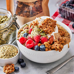 Serving bowl with Michele’s Granola almond butter ready for breakfast.