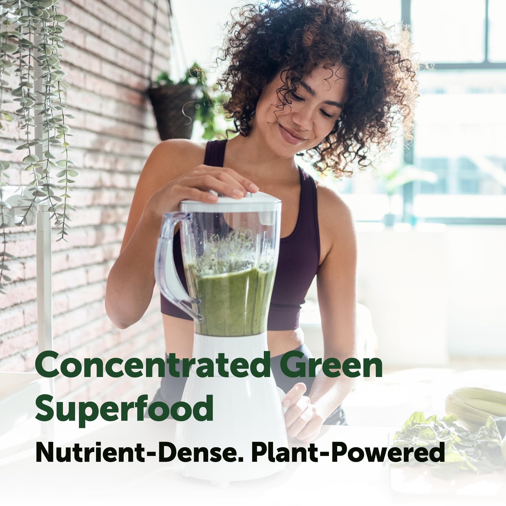 Micro Ingredients spirulina powder pour into a glass to mix with water.