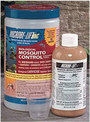 Pouring MICROBE-LIFT BMC into a pond to treat standing water