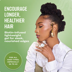 Mielle Organics Rosemary and Mint Edge Control Gel being applied with a brush for edges.