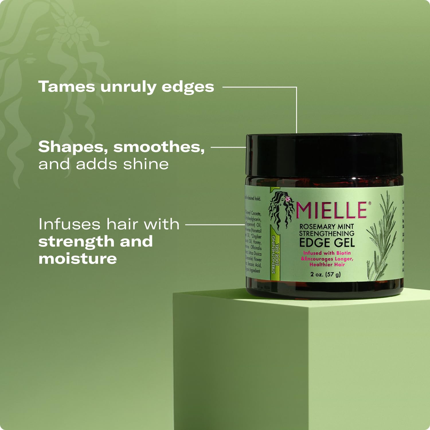 Mielle Organics Rosemary and Mint Edge Control Gel smoothing edges for a neat line.
