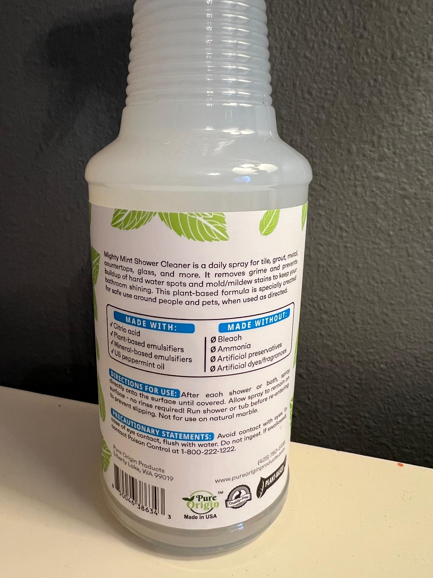 Close-up of Mighty Mint spray mist in action for bathroom surfaces