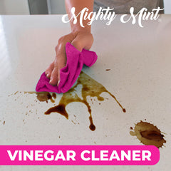 Mighty Mint kitchen counter bottle captures refreshing aroma while tackling grease.