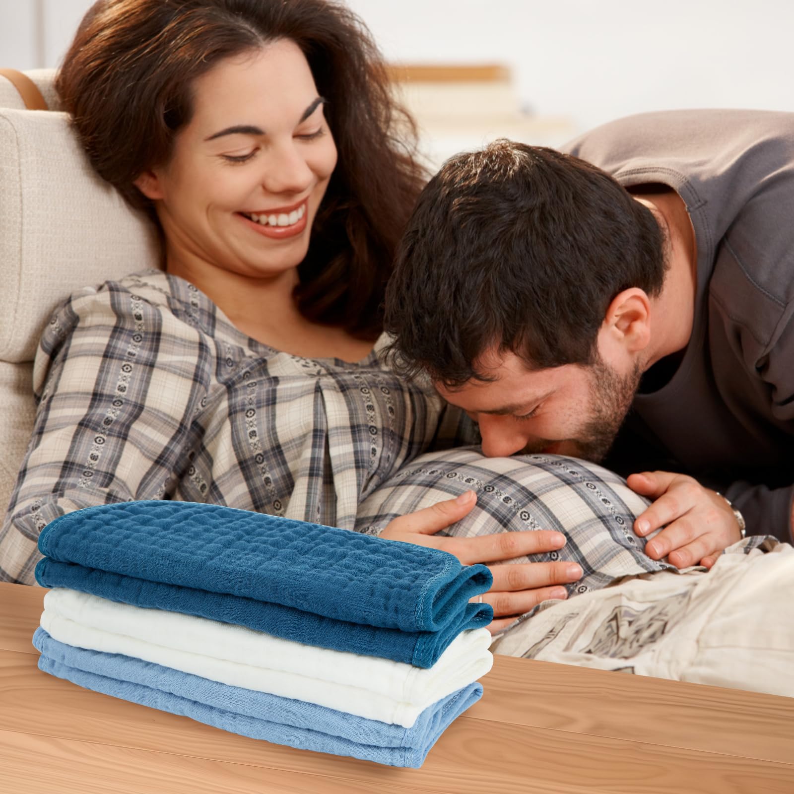 MIGIOL burp cloths in use on caregiver shoulder demonstrating practical protection