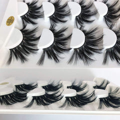 Mikiwi 6D faux mink lashes create a dramatic, cross-design that opens the eye.