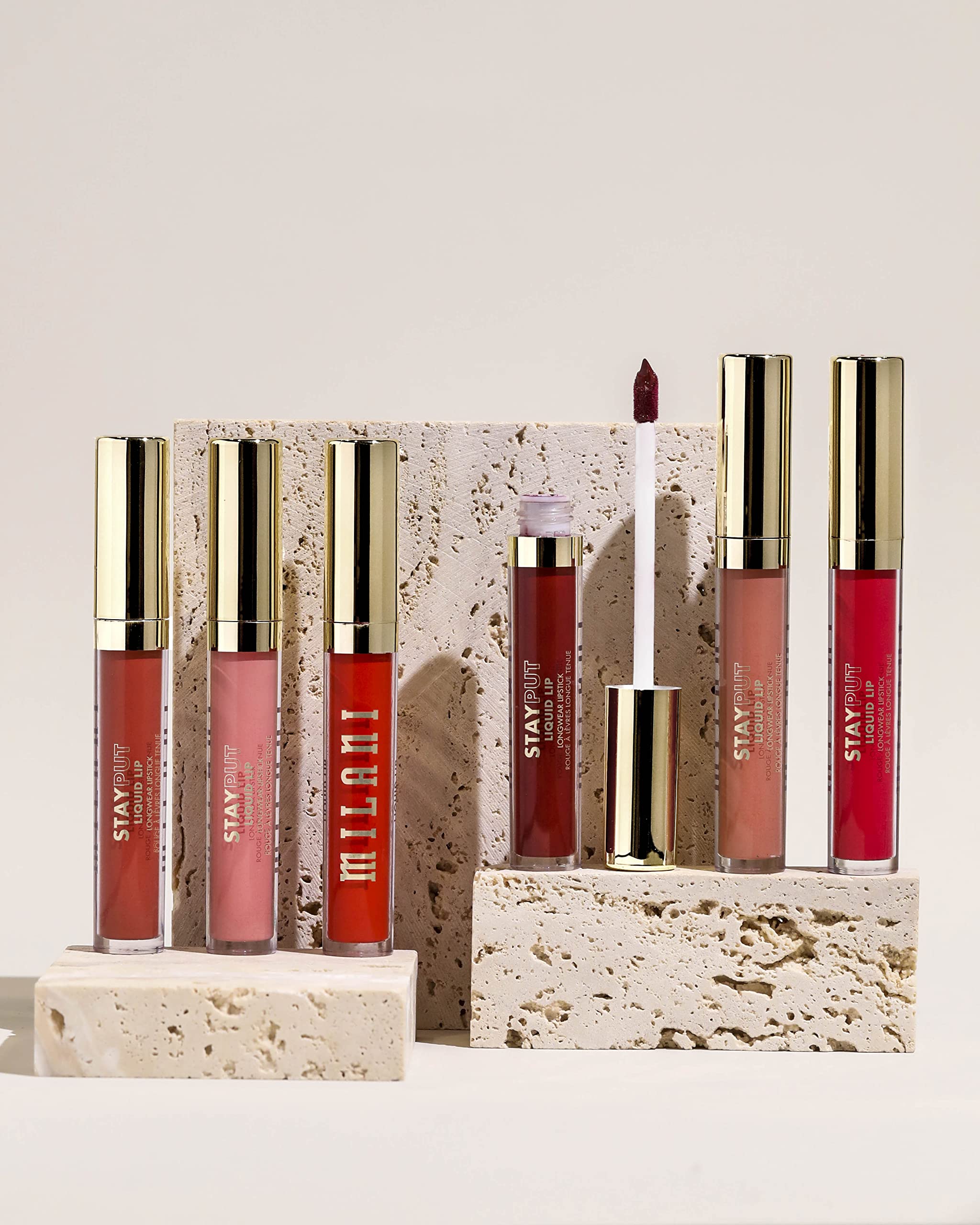 Milani Stay Put Lipstick features avocado oil and Vitamin E for nourishing lips.