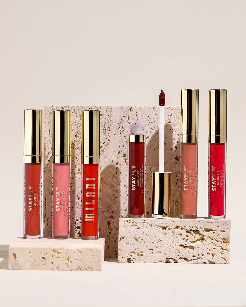 Milani Stay Put Lipstick features avocado oil and Vitamin E for nourishing lips.