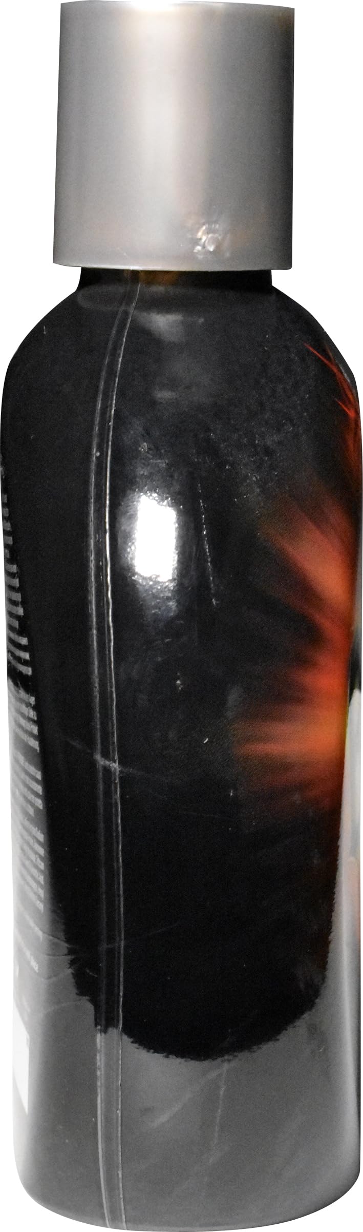 Silicone-rich Millennium Insanely Black 60x formula nourishes skin during tanning.