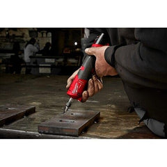 Milwaukee 2486-20 inline die grinder in use for deburring and finishing tasks.