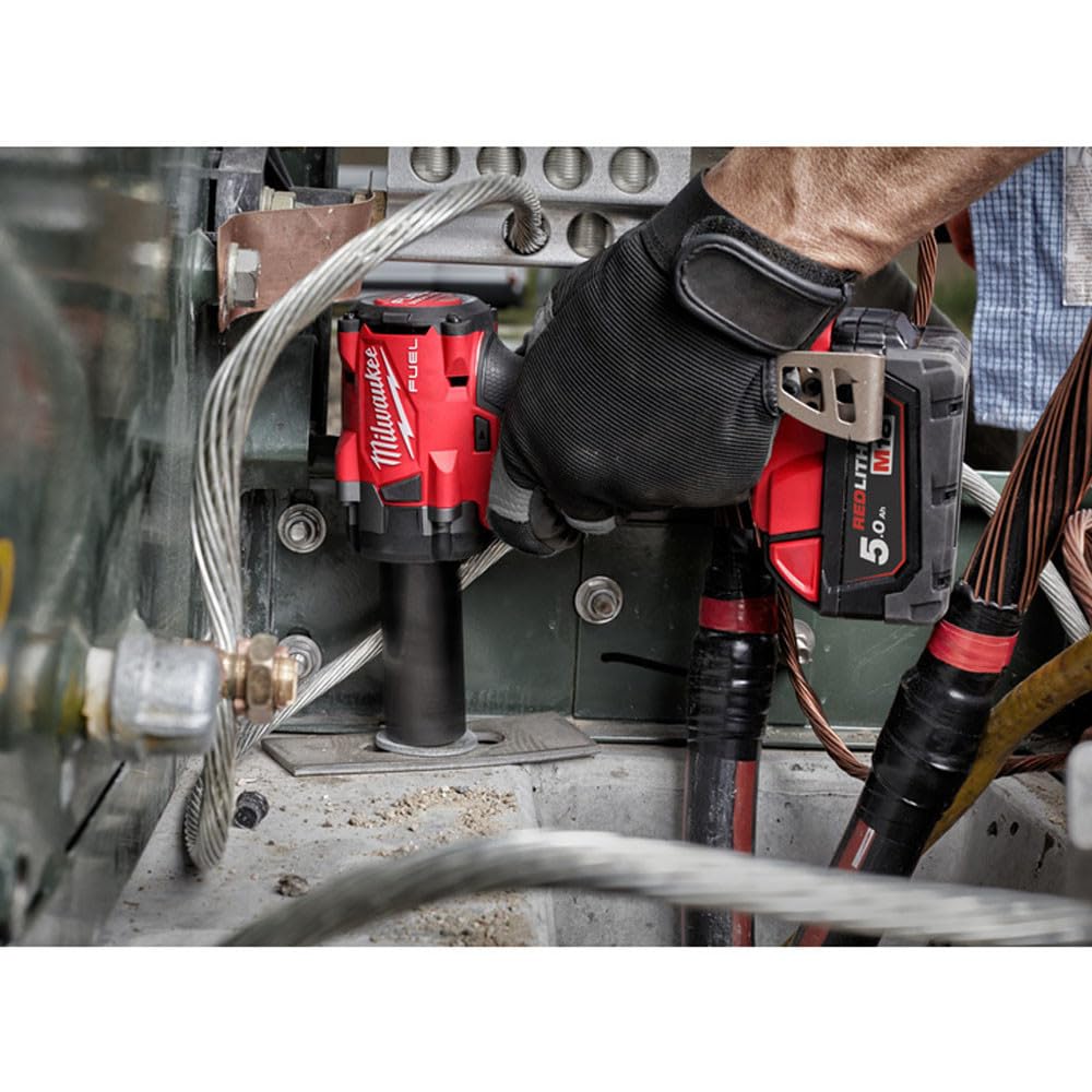 Milwaukee M18 FUEL 3/8-inch compact impact wrench in use with 4-Mode Drive Control for precision.
