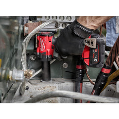 Milwaukee M18 FUEL 3/8-inch compact impact wrench in use with 4-Mode Drive Control for precision.