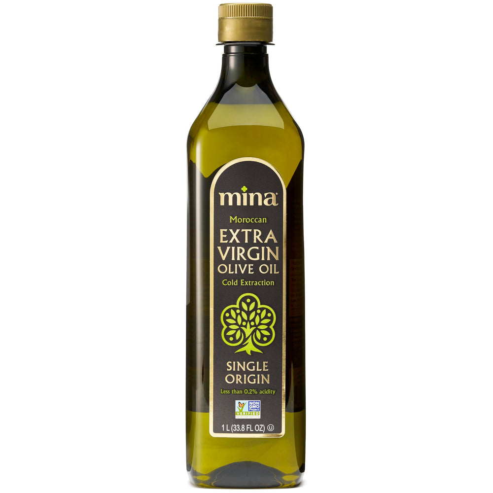 Mina Moroccan Olive Oil bottle ready for light drizzling on salads.